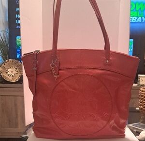 Coach Pink Leather Tote with Structured Design